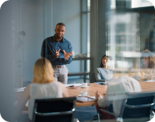 Business meeting with team members discussing strategy